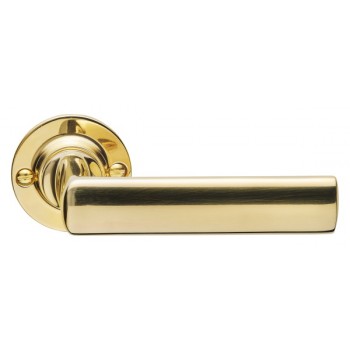 Deurkruk Timeless 1929GRR50 rond rozet messing ongelakt