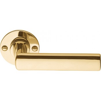 Deurkruk Timeless 1929MRR38 rond rozet messing ongelakt