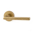 Deurkruk Sara rond rozet messing getrommeld